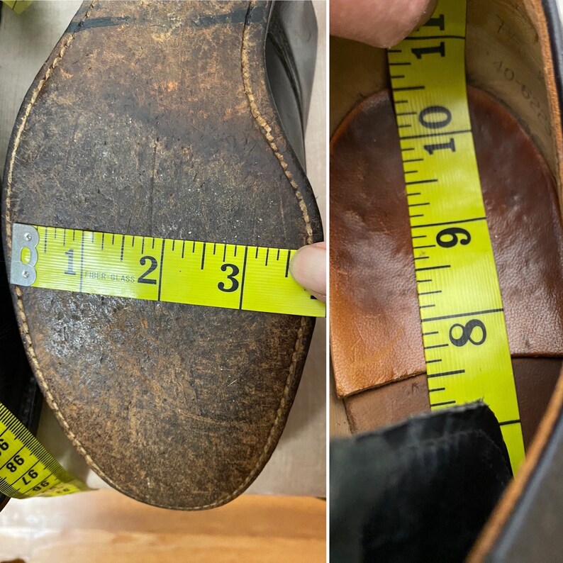May include: Close-up of the inside of a black leather shoe with a brown leather insole. A yellow measuring tape is placed inside the shoe, showing a measurement of 9 inches.