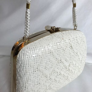 70s White woven wicker basket purse shiny gold accent clasp lacquered long roped straps clam style minimalist mod retro 1960s 1970s image 1