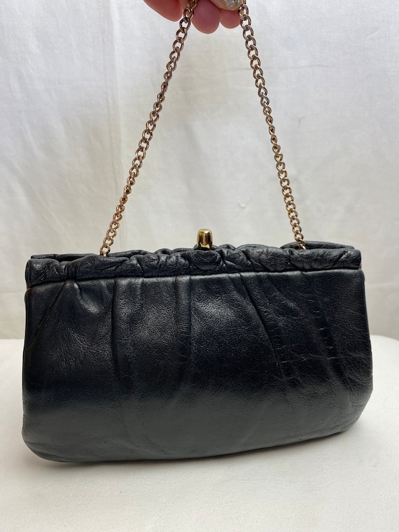 60’s supple & soft black leather clutch purse/wris