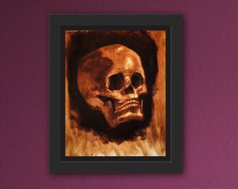 May include: A framed painting of a human skull in a dark brown color, with a light brown background. The skull is tilted to the side, and the painting has a textured, brushstroke effect.