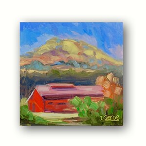 May include: A painting of a red barn with a pink roof in front of a green hill. The sky is blue with white clouds. The artist's signature, J. Geroe, is in the bottom right corner.