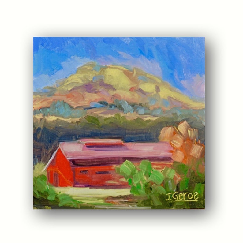 May include: A painting of a red barn with a pink roof in front of a green hill. The sky is blue with white clouds. The artist's signature, J. Geroe, is in the bottom right corner.