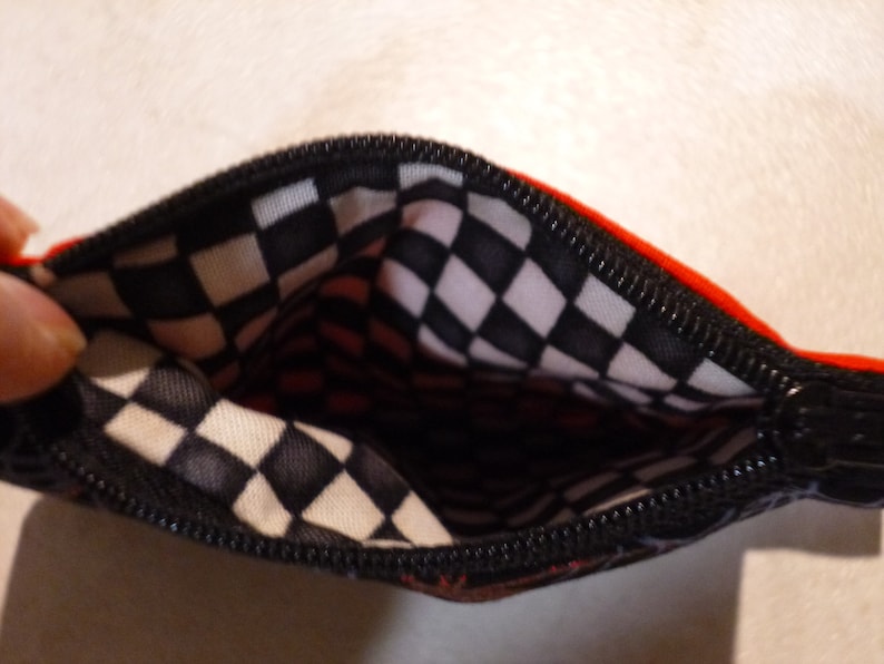 Mini zippered bag Fully lined Ideal for coins lipstick,etc. 11cm x 9cm approx Washable Checkered lining Sparkle Spiders print