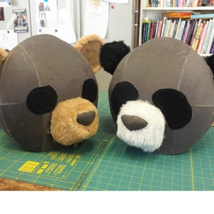 work in progress photo showing adult size teddy bear and panda heads made from fake fur by Tentacle Studio.