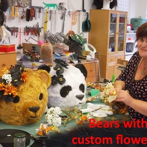 Couples costumes adult size teddy bear and panda heads, with custom flowers decorations for a wedding. made by Tentacle Studio.