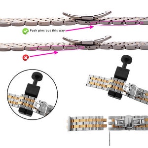 May include: A tool for removing watch band pins. The tool is black with a silver screw. The tool is shown next to a silver and gold watch band. The watch band is shown in two pieces, with the pins removed. The image includes the text "Push pins out this way" with a green checkmark and a red X.