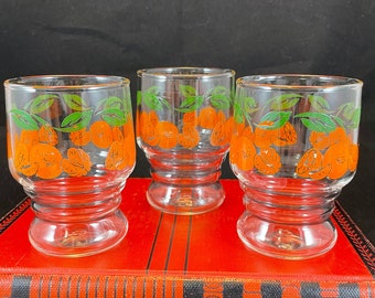 Set of 3 vintage juice glasses, made by Anchor Hocking, bands of embossed oranges and green leaves, 4 oz, discontinued, collectible, nice