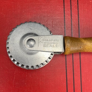 Vintage Krimpkut Sealer, made in USA, US Patent 311191, wood handle, use  for pasta, pies, pastries, ravioli, canapes, perogies, crescents