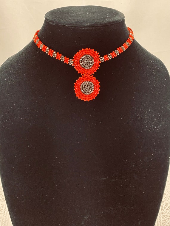 Gorgeous vintage Native hand beaded leather and se