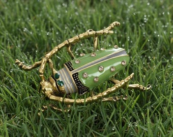 Vintage green enamel Longhorn Beetle brooch
