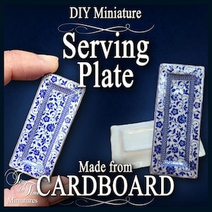 May include: DIY miniature serving plates made from cardboard. The rectangular plates feature a blue and white floral design with a Greek key border. The text "Serving Plate" and "Made from Cardboard" are visible.