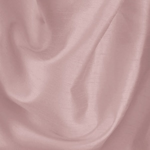 May include: A close-up of a soft, smooth, dusty rose fabric with a subtle sheen. The fabric is draped and folded, creating a luxurious and elegant look.