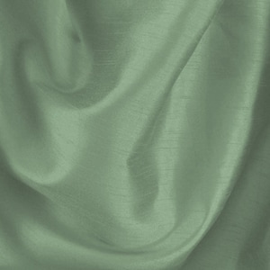 May include: A smooth, sage green fabric with a subtle sheen. The fabric is draped and folded, creating soft, flowing lines.
