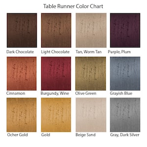 Peut inclure: Nuancier de couleurs pour chemin de table avec 12 échantillons de couleurs différents. Les couleurs sont : Chocolat foncé, Chocolat clair, Beige, Beige chaud, Violet, Prune, Cannelle, Bourgogne, Vin, Vert olive, Bleu gris, Or ocre, Or, Sable beige, Gris, Gris foncé argenté.