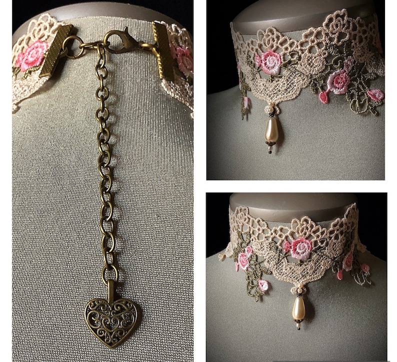 Puede incluir: Un collar gargantilla de encaje delicado con bordados florales de color rosa y verde. El collar presenta un colgante en forma de coraz&oacute;n en una cadena y un colgante de gota de perla.