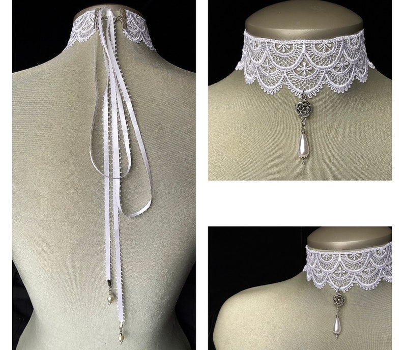 May include: White lace choker necklace with a pearl and flower pendant. The choker has a delicate, scalloped edge and is tied with a white satin ribbon.