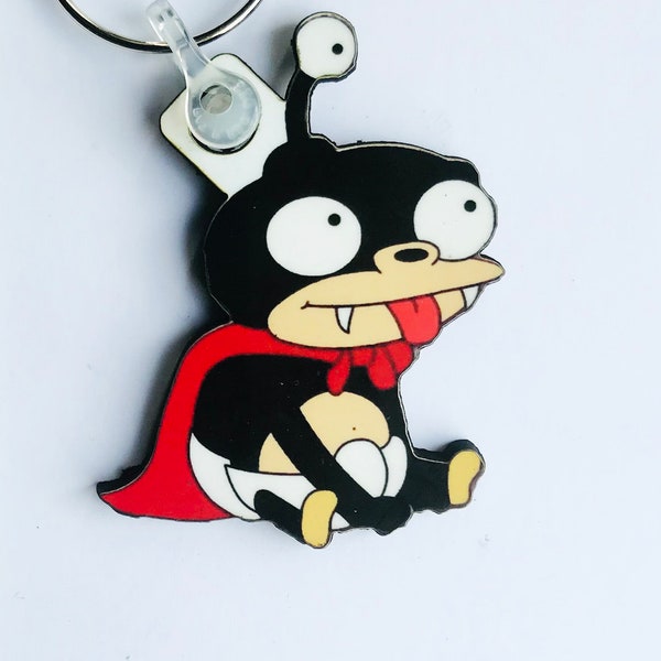 Nibbler - Futurama keyring, pin badge and (new) large magnet. Can be Personalised.