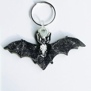 Gothic Bat keyring, pin badge and (new) large magnet. Can be Personalised.