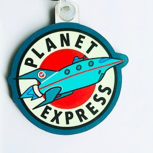 Planet Express - Futurama keyring, pin badge and (new) large magnet. Can be Personalised.
