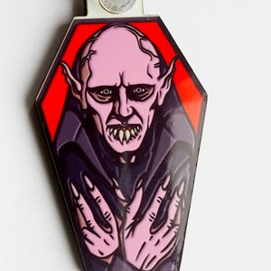 Petyr - What We Do in The Shadows keyring, pin badge and (new) large magnet. Can be Personalised.