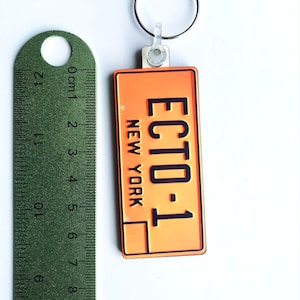 GhostBusters Licence Plate keyring, pin badge and (new) large magnet. Can be Personalised.