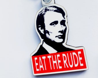 Hannibal eat The Rude keyring, pin badge and (new) large magnet. Can be Personalised.