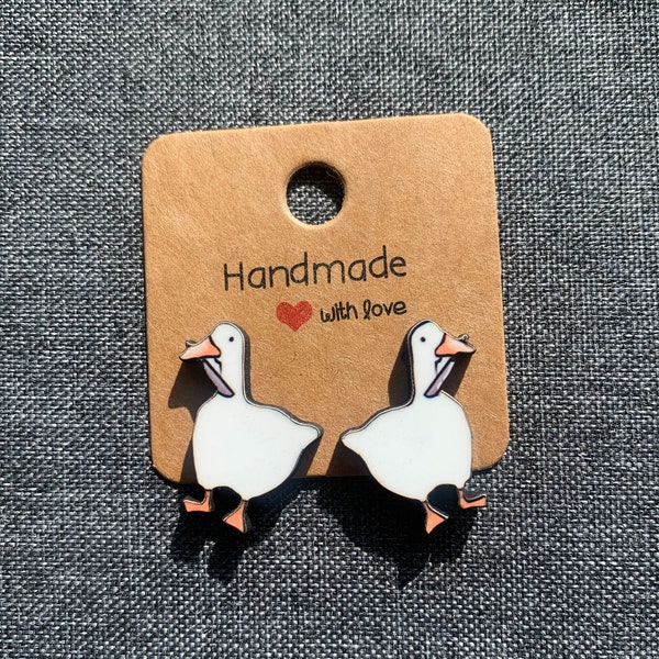 Goose with Knife Stud Earrings- Unique and Intricately Cut earrings.