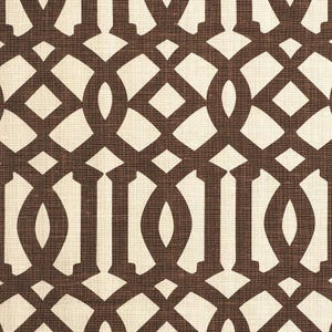 May include: A brown and white geometric pattern on a fabric background. The pattern is made up of repeating circles and squares.
