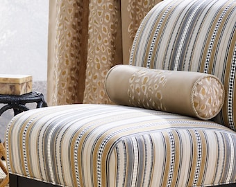 May include: A striped armchair with a leopard print throw pillow. The chair has a dark wood frame and is upholstered in a beige and gray striped fabric. The pillow is beige with a brown leopard print.