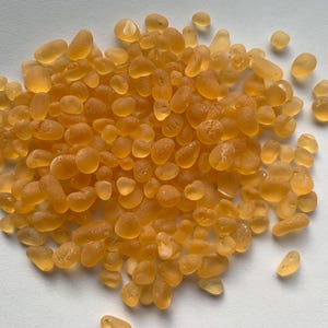 very tiny sea glass stones bright honey yellow color