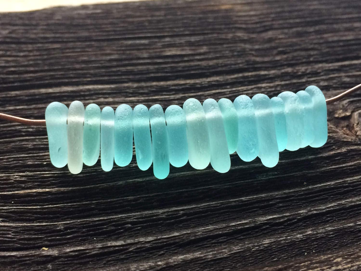 Drilled sea glass beads deals