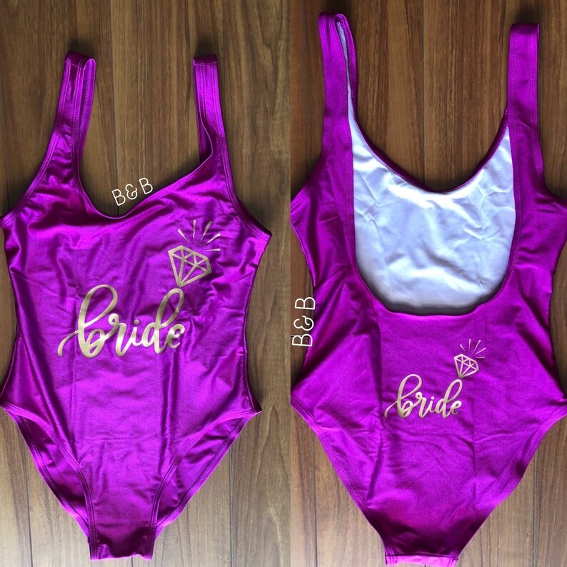 purple and gold swimsuit