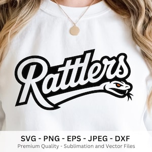 May include: White sweatshirt featuring the word "Rattlers" in a bold, black, stylized font with a snake graphic. The snake has an orange eye and is positioned below the text. The bottom of the image includes text: SVG - PNG - EPS - JPEG - DXF.