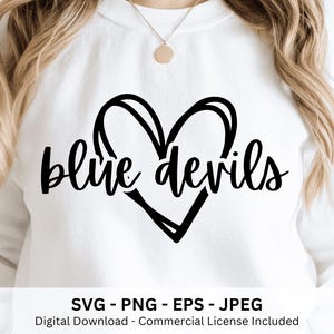May include: White sweatshirt with the words "blue devils" in a black, cursive font, with a heart-shaped design. The bottom of the image includes the text "SVG - PNG - EPS - JPEG" and "Digital Download - Commercial License Included."