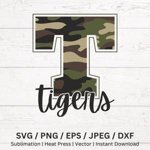 May include: A digital design with the word "tigers" in a script font below a capital letter "T". The "T" is filled with a camouflage pattern in shades of green, brown, and black, outlined in white. The design is set against a white wood-grain background.