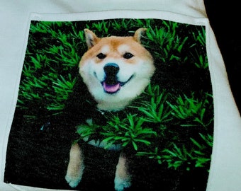 doggo stuck in a bush pocket tee