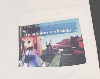 May include: White t-shirt with a pocket featuring a printed image of a cartoon character with pink hair and a blue dress. The text in the image reads "Mint (Barfing is always so refreshing.)"
