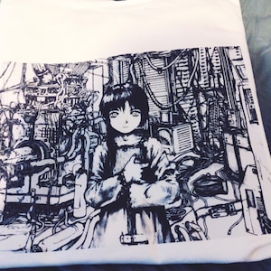 May include: White sweatshirt featuring a black and white anime-style illustration. The graphic depicts a young person with long dark hair, set against a detailed industrial background of machinery and wiring.