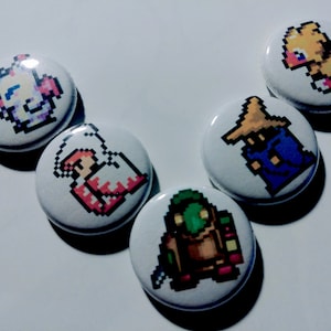 May include: Five round white buttons with different pixelated characters from a video game. The characters are a white mage, a black mage, a warrior, a chocobo, and a red mage.