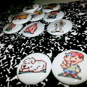 12 one-inch  Earthbound buttons pins