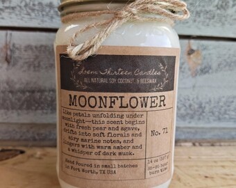 May include: A glass jar candle with a gold lid and a brown paper label reading Moonflower, Loem Thirteen Candles, and scent notes. The label specifies 14 oz (397 g) and 85-95 hour burn time. A piece of twine is tied around the neck of the jar.