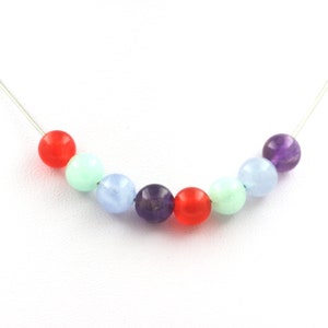 Aquamarine + Amazonite + Amethyst + Orange Chalcedony 8 mm pearl necklace, stainless steel chain length 45 cm.