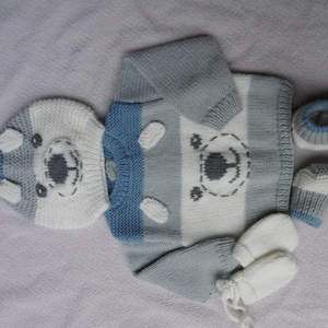 Hand-knitted layette set