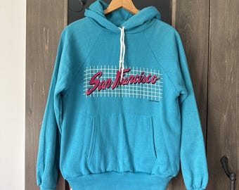 Vintage 80s Wrangler San Francisco Graphic Print Hoodie Unisex M Turquoise Pink