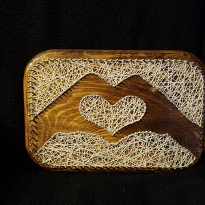 Heart hands string art sign