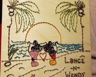 Mickey & Minnie on a beach string art sign