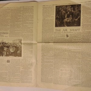 May include: A black and white newspaper page with two articles. The first article is titled "The Jitney Freshman" and the second article is titled "The Air Shaft".