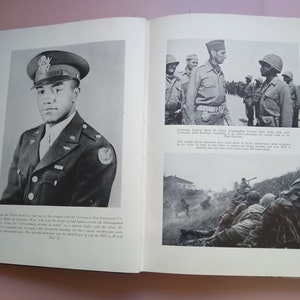 May include: Two black and white photographs of soldiers in uniform. The first photo shows a soldier in a military uniform with a serious expression. The second photo shows two soldiers talking to each other. The text below the photos reads "Lieutenant George Mott W. Clark, Commanding General Field Army, with the Lieutenant John Booker, Commanding the combat zone of the 3rd Infantry Division."