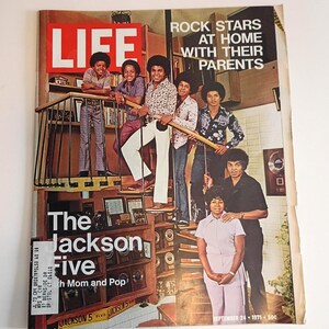 May include: A vintage LIFE magazine cover featuring The Jackson 5 with their parents. The cover includes the text "ROCK STARS AT HOME WITH THEIR PARENTS" and "The Jackson Five." The magazine is dated September 24, 1971.