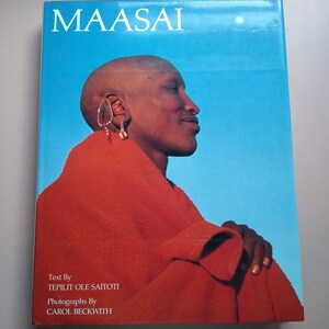 MAASAI, Text By Tepilit Ole Saitoti Photograph By Carol Beckwith